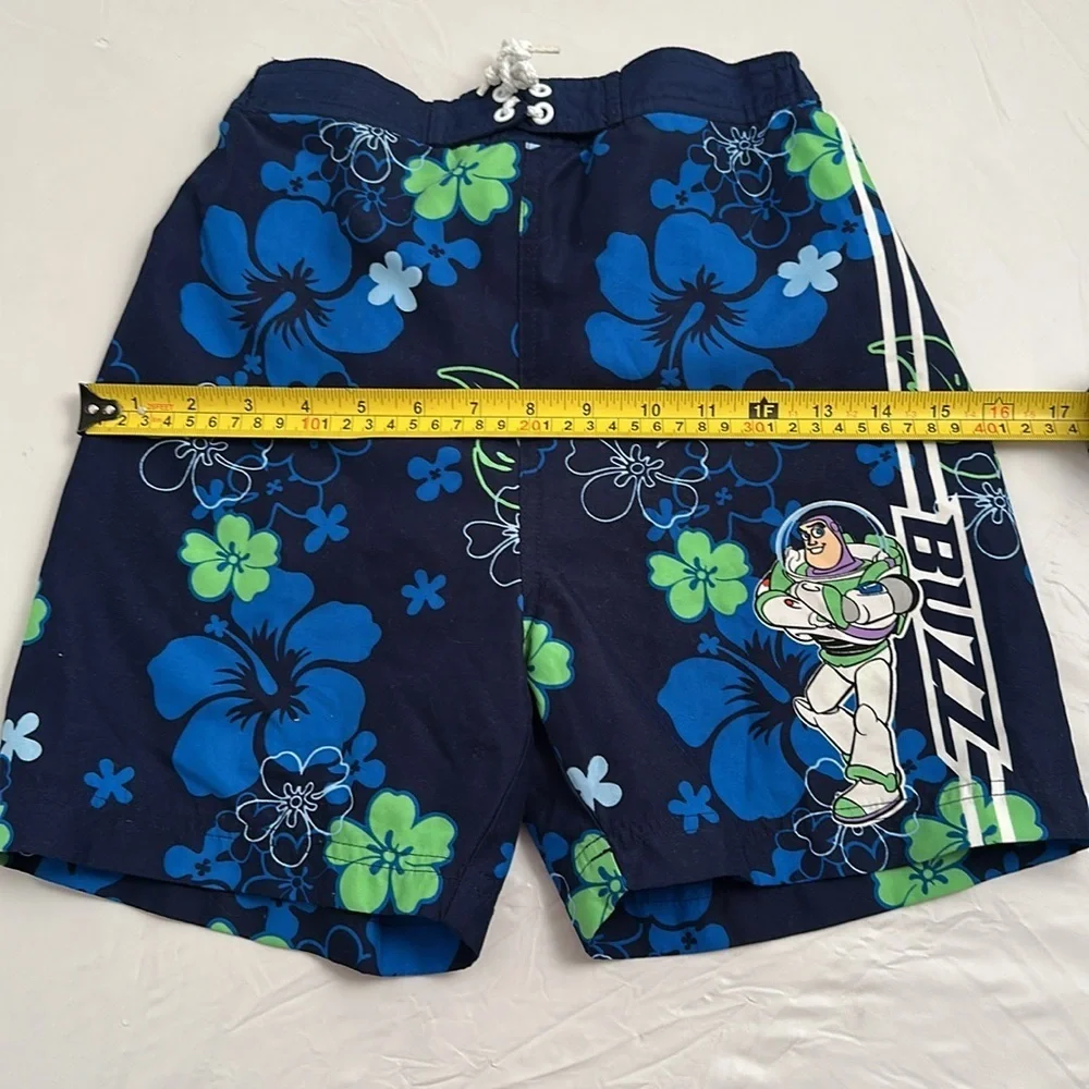 Disney blue green hibiscus print Buzz Lightyear mesh lined swim trunks M